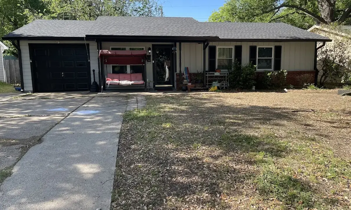 Asphalt Shingle Roof Repair crew at work on a residential roof in Murray
